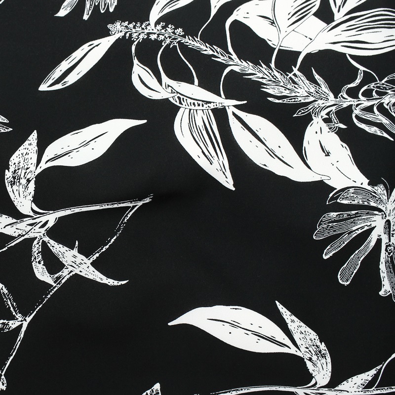 Black polyester printed floral fabric